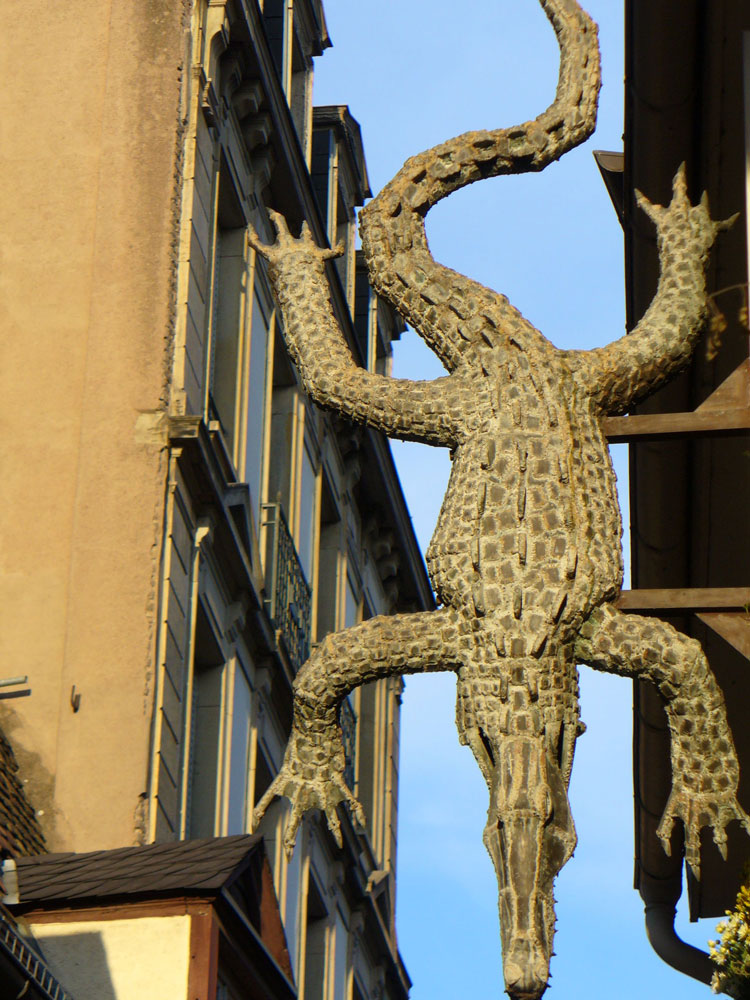 "The Crocodile" restaurant's shop sign in Strasbourg